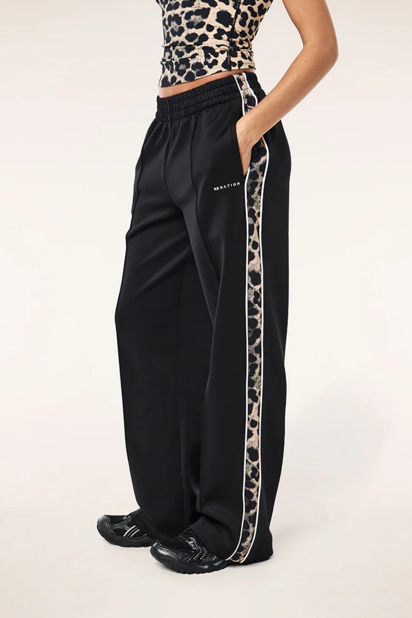 MAN DOWN TRACK PANT IN BLACK AND LEOPARD