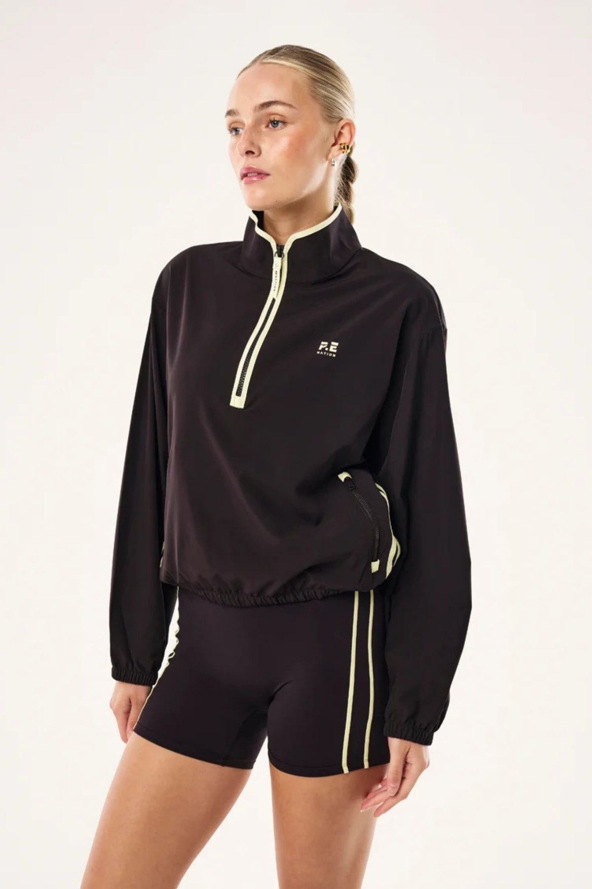 ECHO QUARTER ZIP IN BLACK BEAN