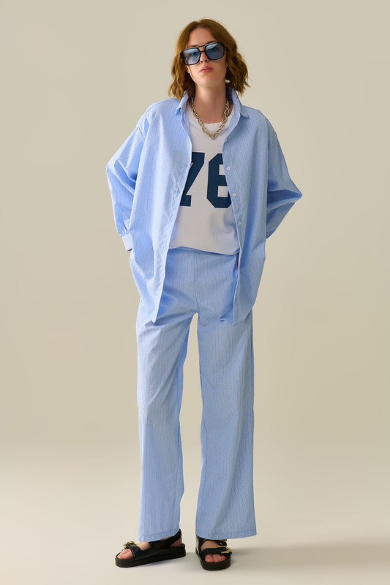 BLUE STRIPED WIDE LEG PANTS WITH STRASS EMBELLISHMENT