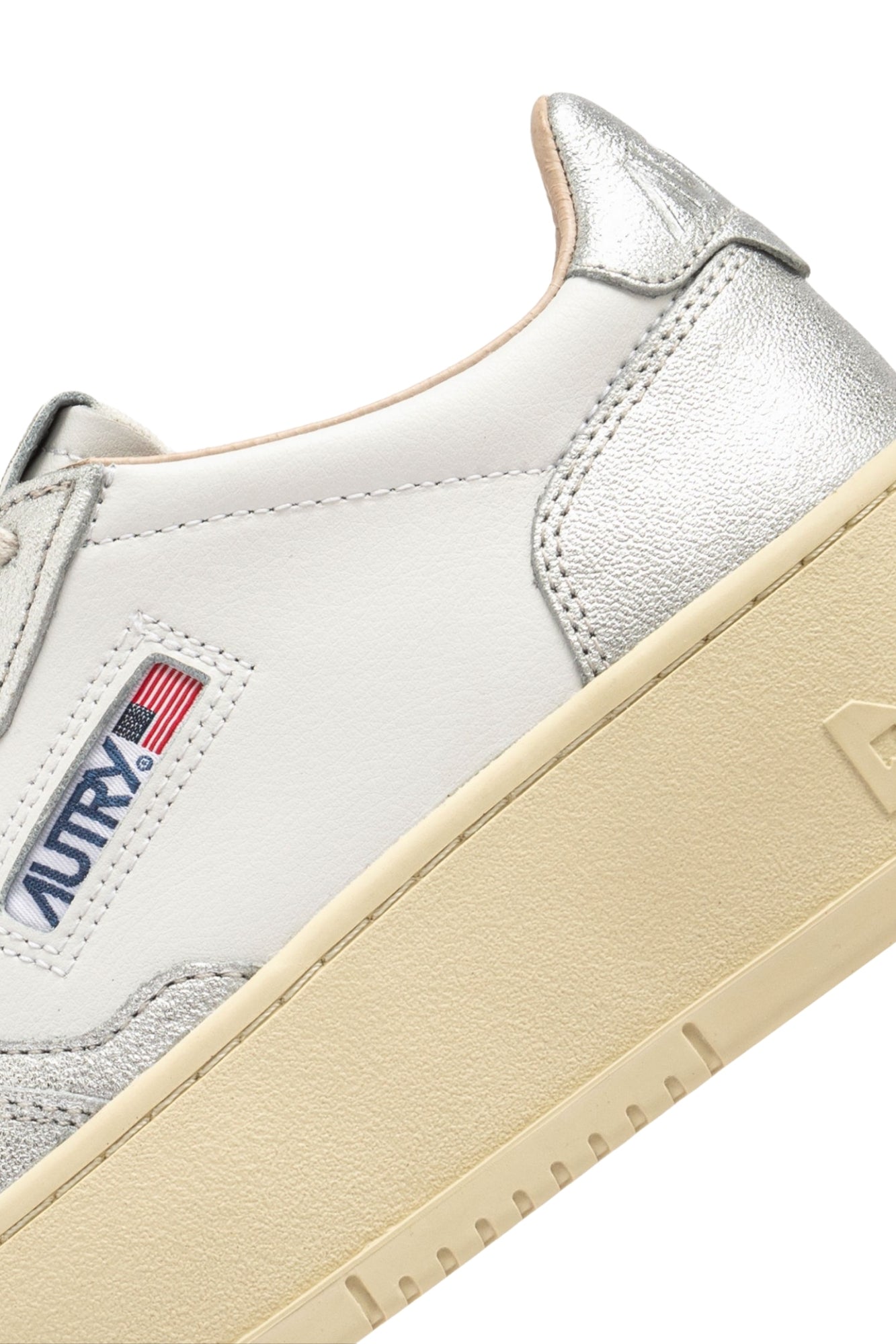 MEDALIST PLATFORM SNEAKERS IN WHITE AND SILVER LEATHER