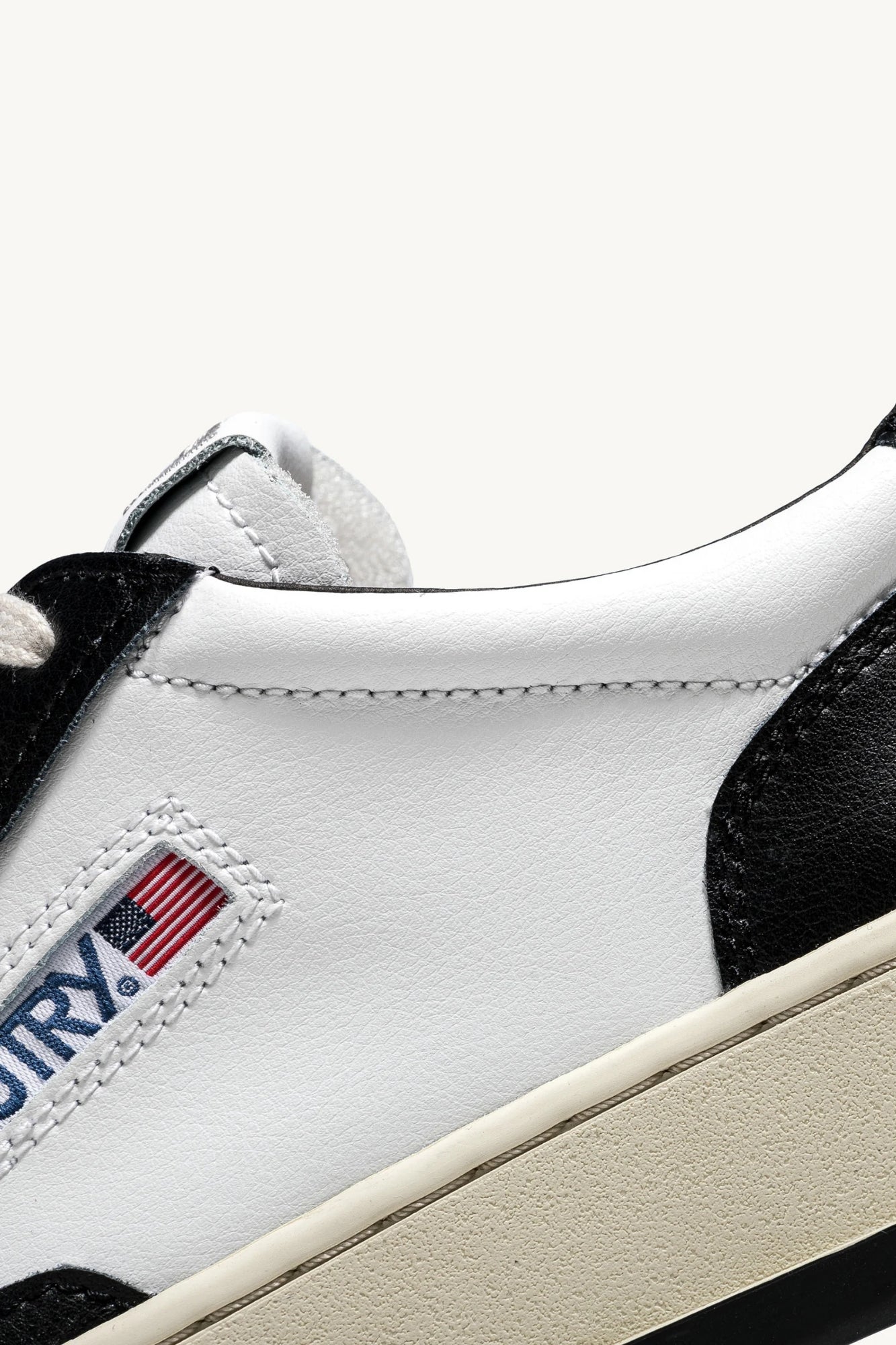 MEDALIST LOW BICOLOR SNEAKERS IN WHITE AND BLACK LEATHER