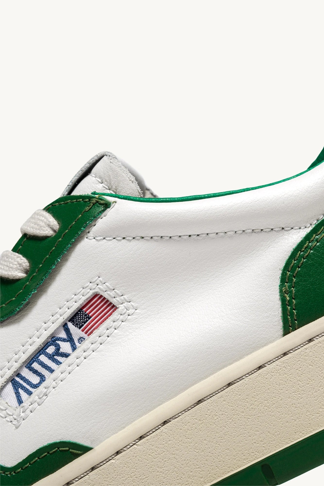 MEDALIST LOW BICOLOR SNEAKERS IN WHITE AND GREEN LEATHER