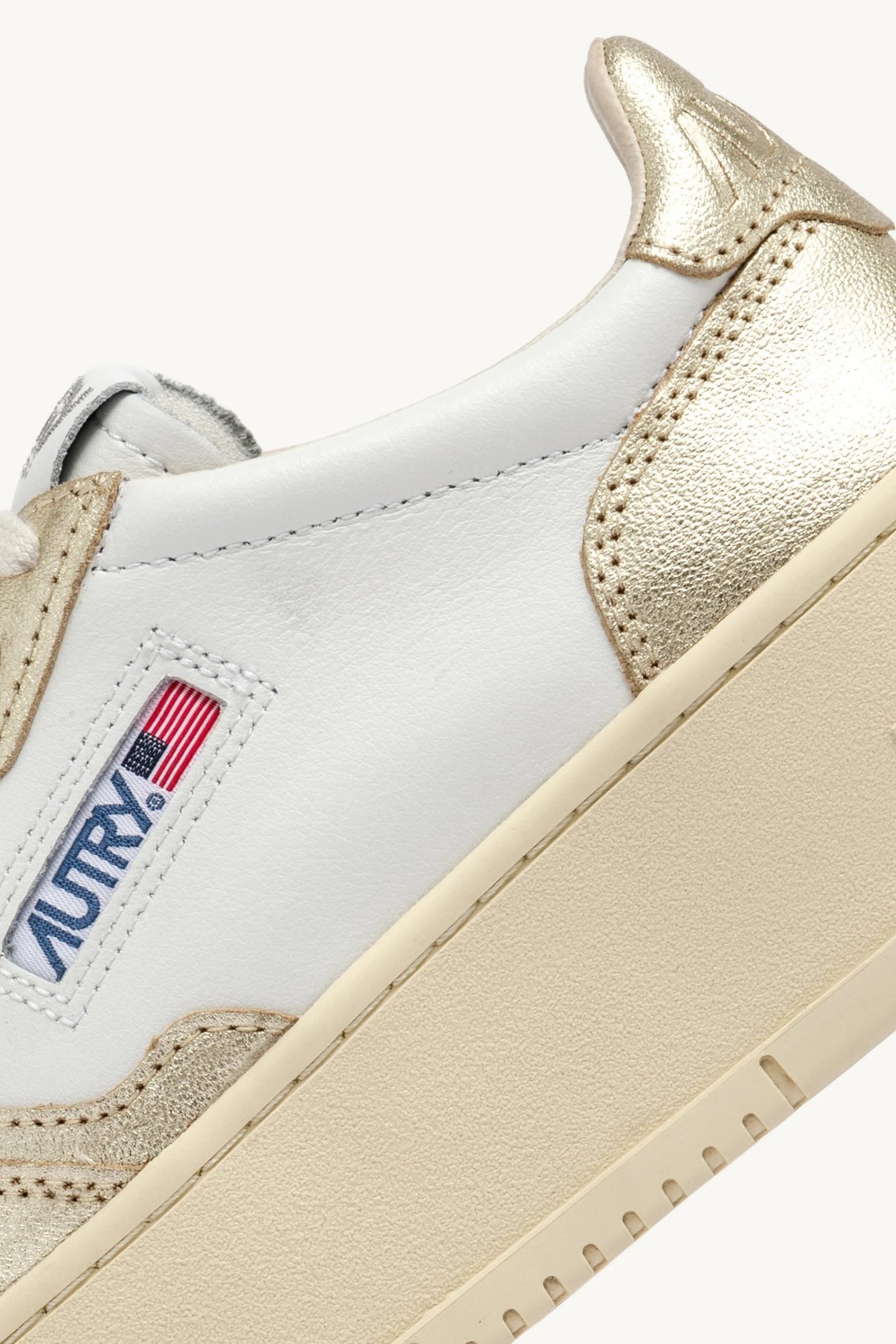 MEDALIST PLATFORM SNEAKERS IN WHITE AND PLATINUM LEATHER