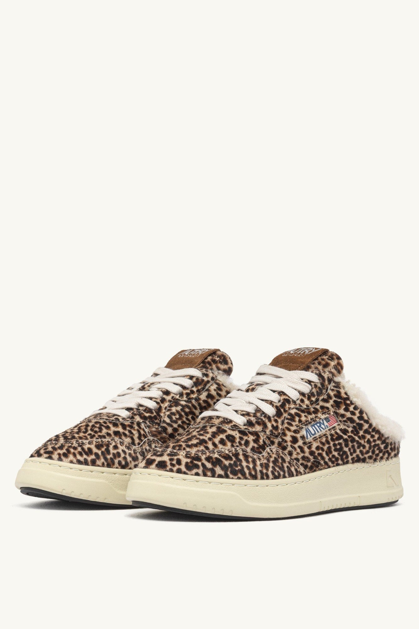 MEDALIST MULE SNEAKERS IN LEOPARD PONY HAIR EFFECT AND SHEARLING