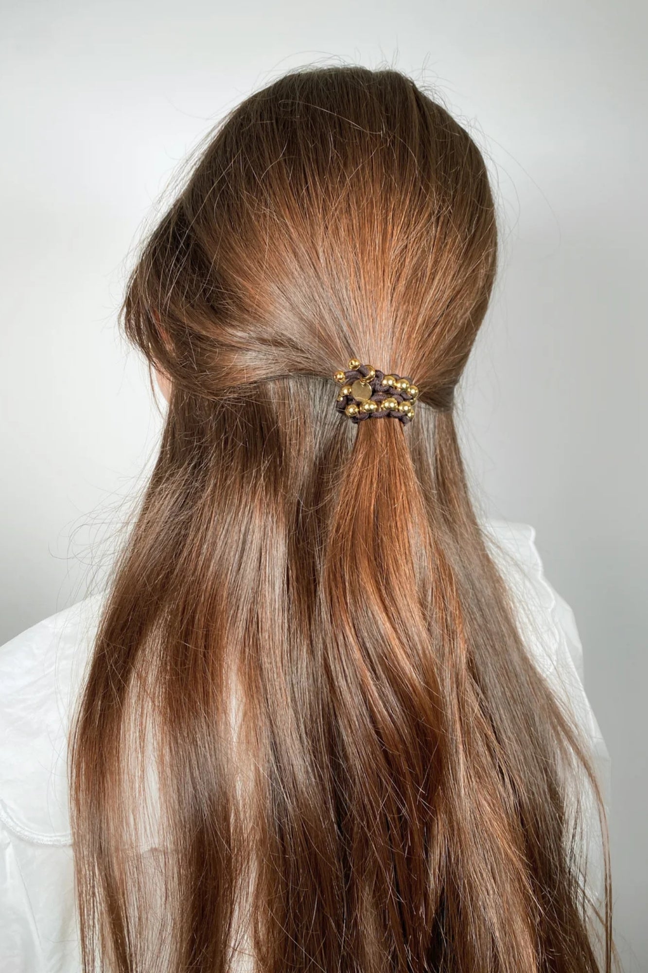 BICHOU ROUND GOLD BEADS AND BROWN ELASTIC HAIR TIE